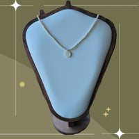 Genuine freshwater pearl strand with hand carved mother-of-pearl flower charm by Sunny Z Jewelry