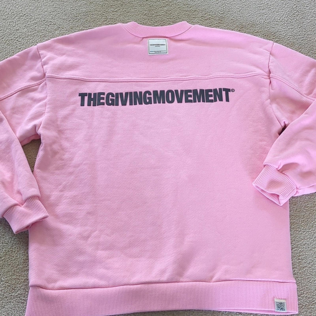 The Giving Movement Pink Logo Patch sweater
