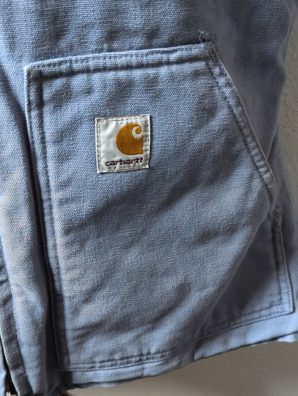 Light blue vintage Carhartt women's sandstone/duck canvas sherpa-lined Vest  - Small