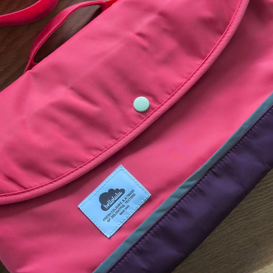 Hellolulu Nylon iPad All Day Messenger Bag In Pink / Purple