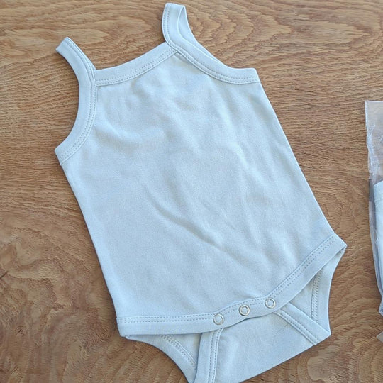Kate Quinn plein air color tank top onesies