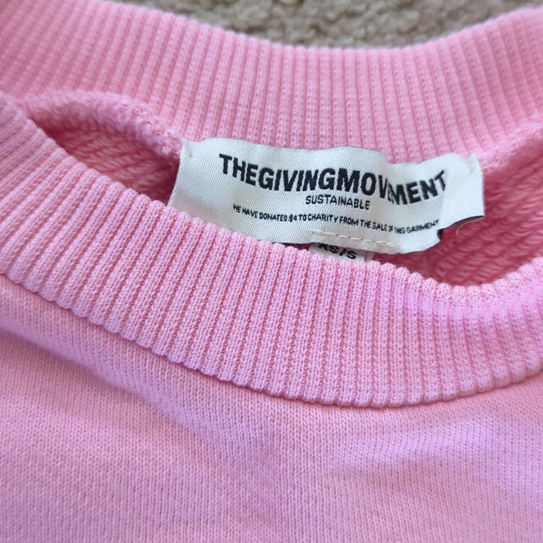 The Giving Movement Pink Logo Patch sweater