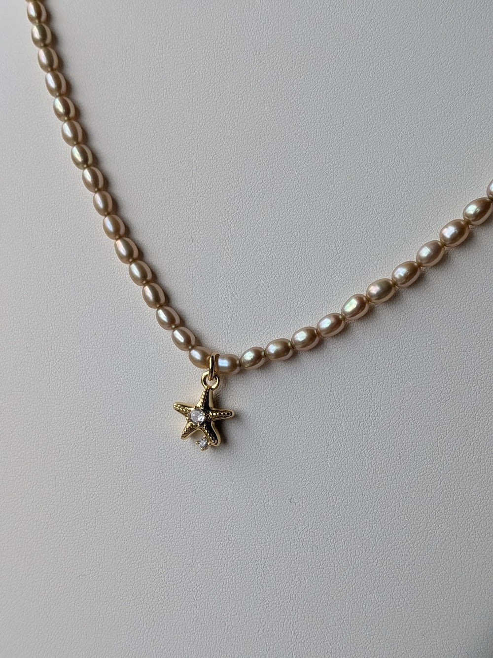Genuine freshwater pearl strand with 14k gold filled CZ starfish charm by Sunny Z Jewelry