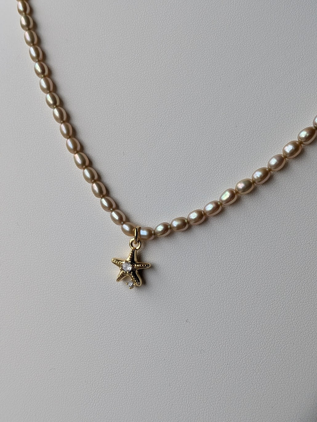 Genuine freshwater pearl strand with 14k gold filled CZ starfish charm by Sunny Z Jewelry