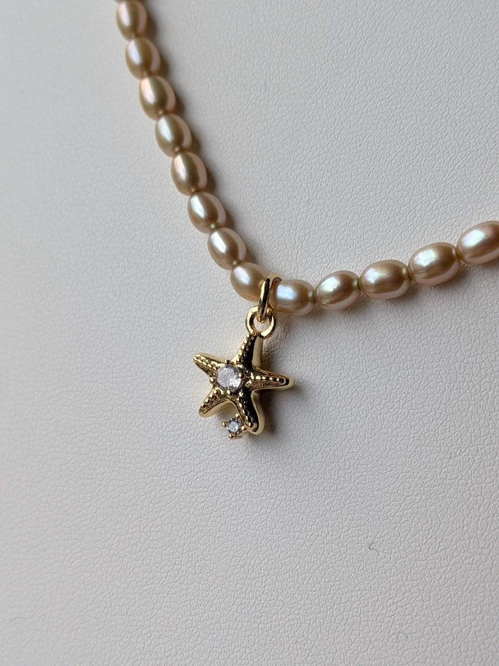 Genuine freshwater pearl strand with 14k gold filled CZ starfish charm by Sunny Z Jewelry
