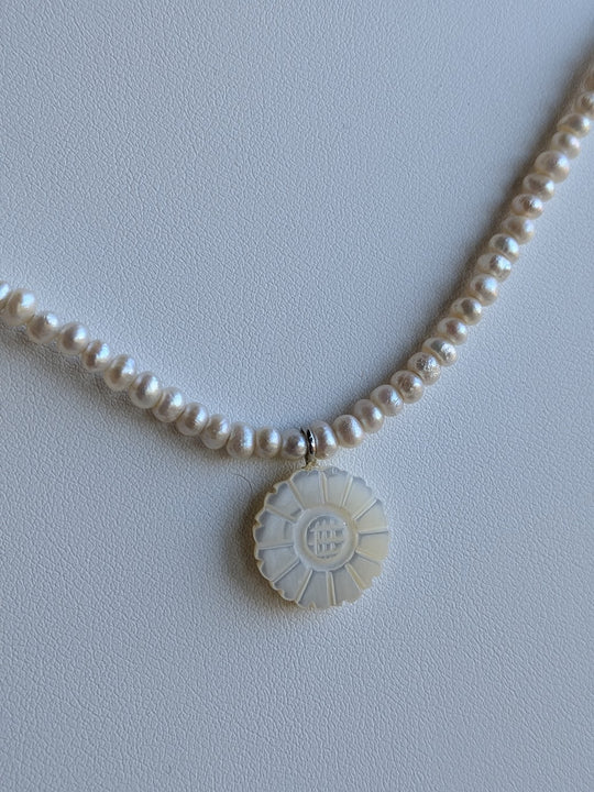 Genuine freshwater pearl strand with hand carved mother-of-pearl flower charm by Sunny Z Jewelry
