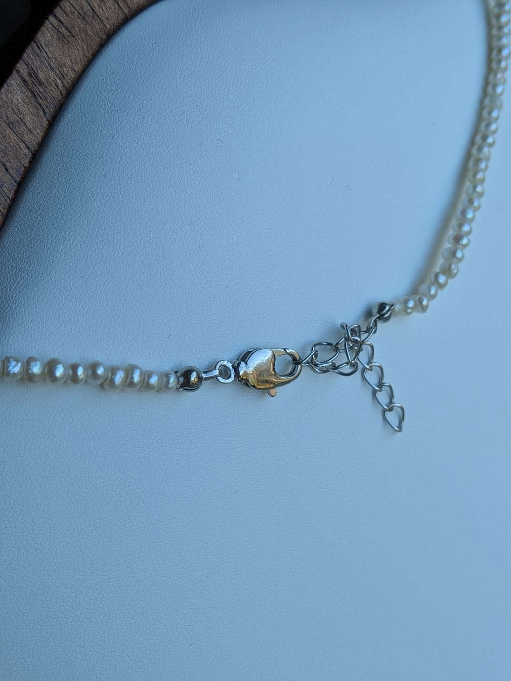 Genuine freshwater pearl strand with hand carved mother-of-pearl flower charm by Sunny Z Jewelry