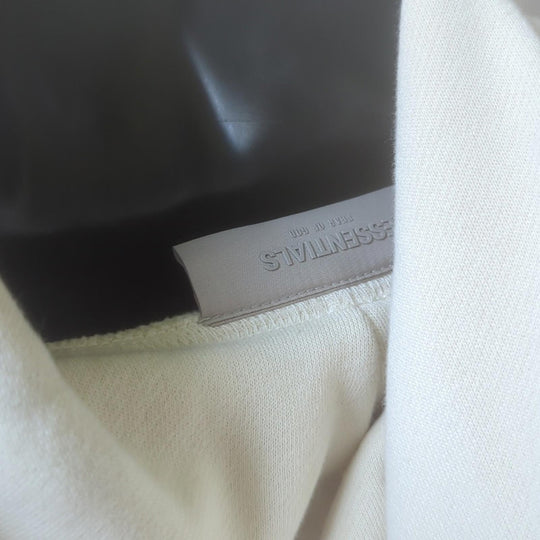 Fear Of God Essentials Relaxed Fit Hoodie In Egg
