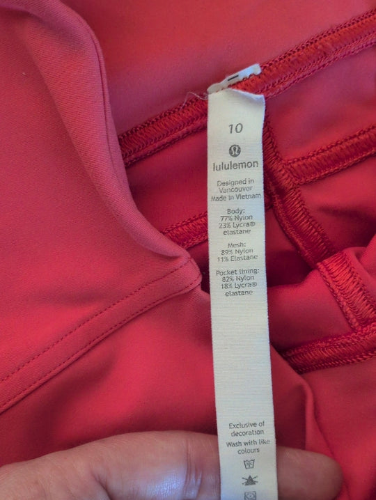 Lululemon Pink/Coral Mesh Legging With Pockets Size 10