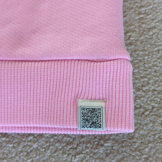 The Giving Movement Pink Logo Patch sweater