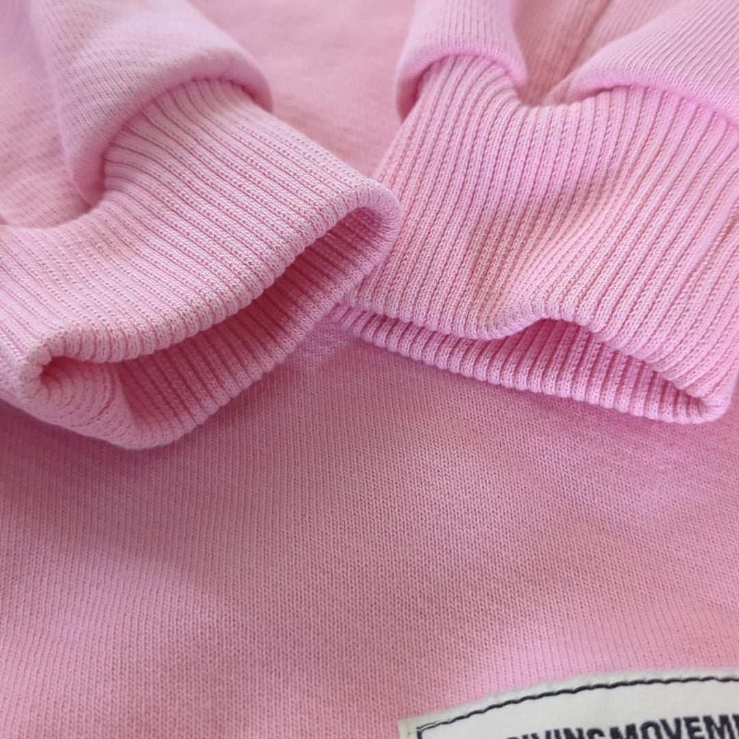 The Giving Movement Pink Logo Patch sweater