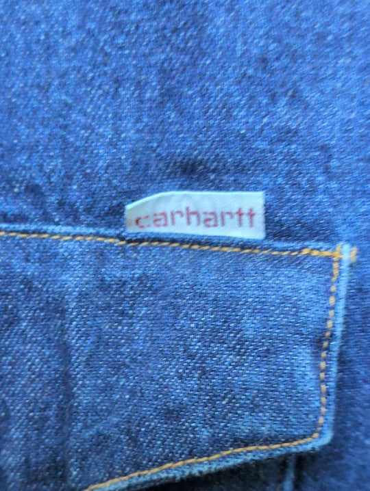 Vintage Carhartt SU008 denim pearl snap shirt In Dark Wash 18 X 36 (XL)